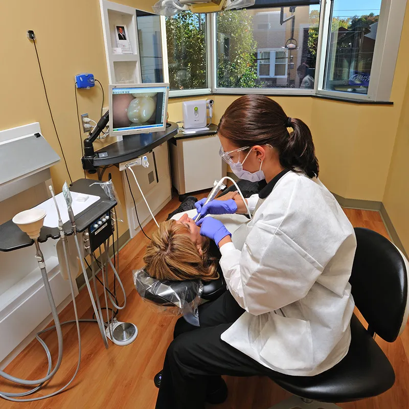 Staff member working with a patient